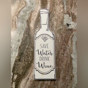 Gray and White Decorative Accent Bottle Sign